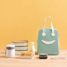 笑脸便携手提饭盒袋卡通可爱保温餐包 员工活动奖品